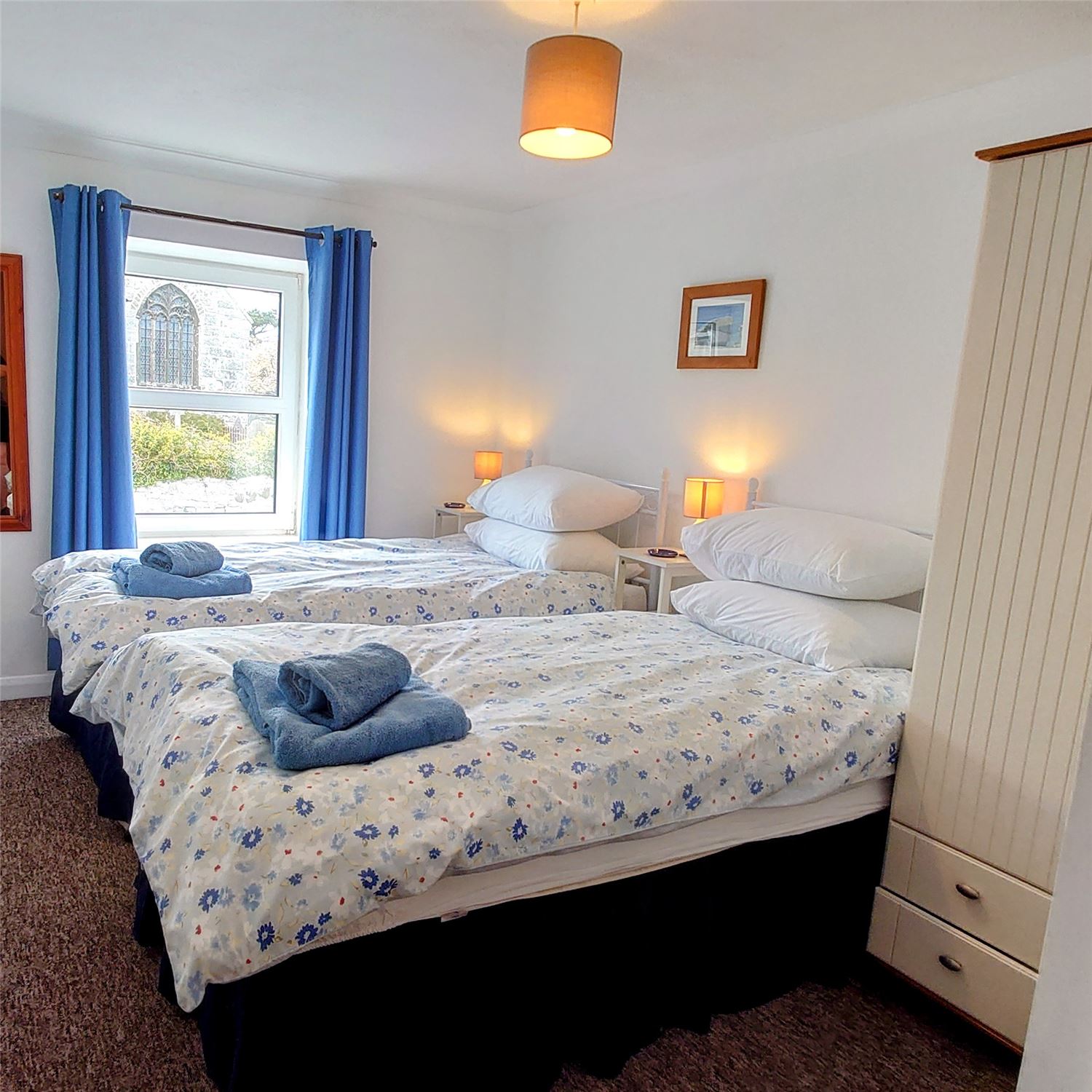Lebanon Cottage twin room, made up as two beds, wardrobe, beds made up with crisp linen and towels laid out