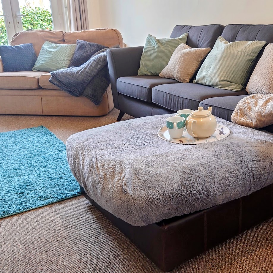 Lebanon Cottage lounge with comfy sofas and tea tray
