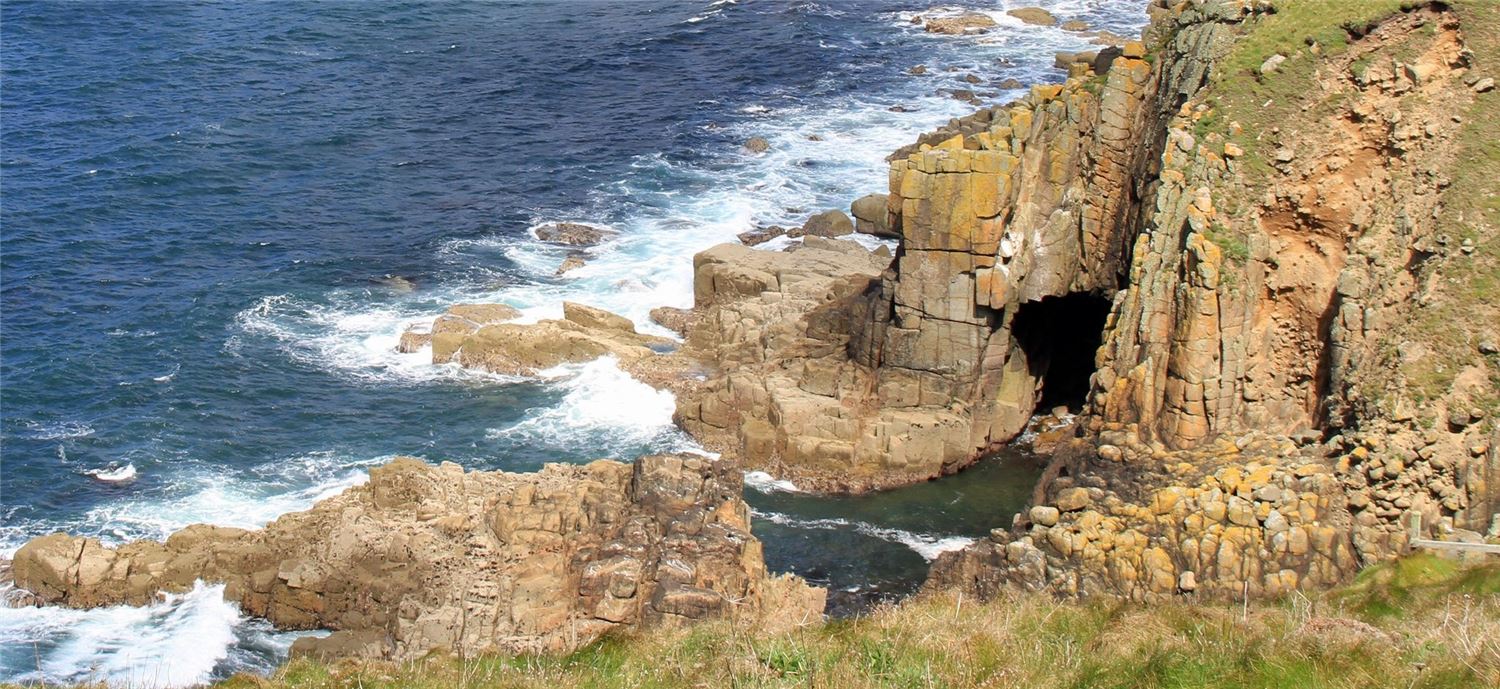 Land's End Cornwall, rugged rocks and sea in the sunshine